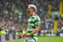 GLASGOW, SCOTLAND - SEPTEMBER 14: Celtic's Luke McCowan celebrates as he scores to make it 2-0 during a William Hill Premiership match between Celtic and Heart of Midlothian at Celtic Park, on September 14, 2024, in Glasgow, Scotland. (Photo by Rob Casey