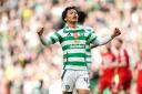 Celtic's Reo Hatate celebrates scoring their side's first goal of the game during the William Hill Premiership match at Celtic Park, Glasgow. Picture date: Saturday October 19, 2024. PA Photo. See PA story SOCCER Celtic. Photo credit should read: Jane