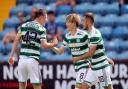 Kyogo celebrates after kicking off Celtic's rout of Kilmarnock.