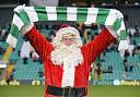 Santa takes in a match in Paradise