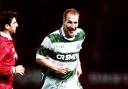 Chic Charnley laughs as he waltez away from Eric Cantona