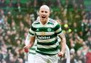 Aaron Mooy celebrates scoring against Morton