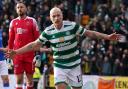 Aaron Mooy celebrates making it 3-1 to Celtic against St Johnstone