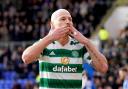 Aaron Mooy celebrates against St Johnstone