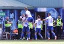 The Killie players celebrate their goal