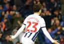 Mikey Johnston celebrates scoring for West Brom