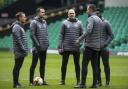 Brendan Rodgers and Chris Davies stand among the Celtic backroom team