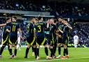 Scotland players celebrate at Hampden