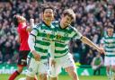 GLASGOW, SCOTLAND - APRIL 13: Celtic's Reo Hatate celebrates with Matt O'Riley after scoring to make it 1-0 during a cinch Premiership match between Celtic and St Mirren at Celtic Park, on April 13, 2024, in Glasgow, Scotland. (Photo by Craig Williamson