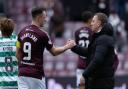 EDINBURGH, SCOTLAND - MARCH 03: Celtic Manager Brendan Rodgers shakes hands with Hearts' Lawrence Shankland at full time during a cinch Premiership match between Heart of Midlothian and Celtic at Tynecastle Park, on March 03, 2024, in Edinburgh,