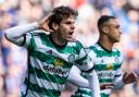 Celtic's Paulo Bernardo celebrates with Adam Idah last season