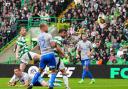 Celtic’s Liam Scales (left) scores their side's second goal of the game during the William Hill Premiership match at Celtic Park, Glasgow. Picture date: Sunday August 4, 2024. PA Photo. See PA story SOCCER Celtic. Photo credit should read: Jane