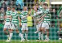 Celtic’s Liam Scales (centre left) celebrates with teammates after scoring their side's first goal of the game during the William Hill Premiership match at Celtic Park, Glasgow. Picture date: Sunday August 4, 2024. PA Photo. See PA story SOCCER Celtic.