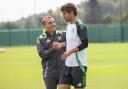 GLASGOW, SCOTLAND - AUGUST 02: Celtic manager Brendan Rodgers with Matt O'Riley during a Celtic training session at Lennoxtown Training Centre, on August 02, 2024, in Glasgow, Scotland. (Photo by Craig Williamson / SNS Group)