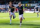 Luke McCowan celebrates after scoring for Dundee