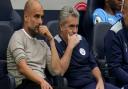 Juanma Lillo and Pep Guardiola in the Manchester City dugout