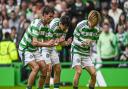 Kyogo and O'Riley celebrate with Nicolas Kuhn at Celtic Park