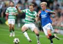 Celtic's Alistair Johnston (left) and Rangers' Ross McCausland battle for the ball during the William Hill Premiership match at Celtic Park, Glasgow. Picture date: Sunday September 1, 2024. PA Photo. See PA story SOCCER Celtic. Photo credit should read: