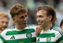 Arne Engels celebrates with Alistair Johnston after Celtic's win over Rangers