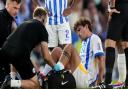 Matt O'Riley receiving treatment during his first match at Brighton