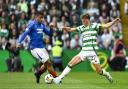 Celtic's Arne Engels tackles Rangers’ Hamza Igamane