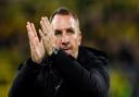 Brendan Rodgers applauds the travelling Celtic support in Germany