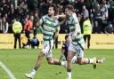 Nicolas Kuhn and James Forrest celebrate in Dingwall against Ross County