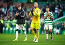 Celtic goalkeeper Kasper Schmeichel (centre), Arne Engels (left) and Alex Valle applaud the fans after the final whistle in the William Hill Premiership match at Celtic Park, Glasgow. Picture date: Saturday October 19, 2024. PA Photo. See PA story SOCCER