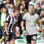 Mark O'Hara celebrates after heading St Mirren into the lead against Celtic.