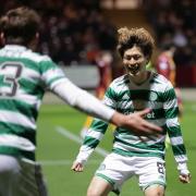 Kyogo celebrates after hitting the opener for Celtic against Motherwell.