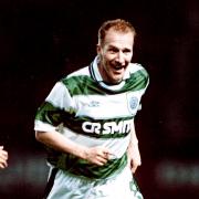 Chic Charnley laughs as he waltez away from Eric Cantona