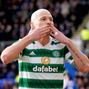 Aaron Mooy celebrates against St Johnstone