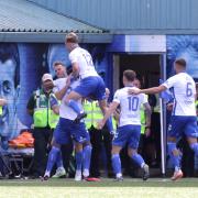 The Killie players celebrate their goal