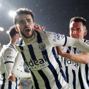 Mikey Johnston celebrates scoring for West Brom