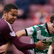 Paulo Bernardo and Toby Sibbick battle for the ball in last match between Hearts and Celtic