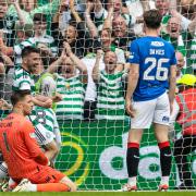 Greg Taylor celebrates in front of Jack Butland and Ben Davies