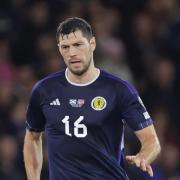 Scott McKenna in action for the national team