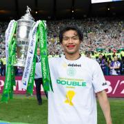 Reo Hatate lifts the Scottish Cup