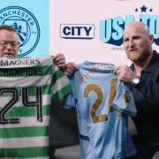 Paul Dickov and John Hartson exchange shirts