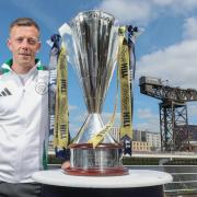 Celtic skipper Callum McGregor with the William Hill Premiership trophy on the Clyde tuesday. STY  Sport
Picture Gordon Terris Herald & Times
30/7/24