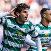 Celtic's Paulo Bernardo celebrates with Adam Idah last season