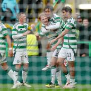 Celtic’s Liam Scales (centre left) celebrates with teammates after scoring their side's first goal of the game during the William Hill Premiership match at Celtic Park, Glasgow. Picture date: Sunday August 4, 2024. PA Photo. See PA story SOCCER Celtic.