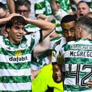 Paulo Bernardo and Callum McGregor celebrate with Adam Idah at Hampden