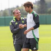 GLASGOW, SCOTLAND - AUGUST 02: Celtic manager Brendan Rodgers with Matt O'Riley during a Celtic training session at Lennoxtown Training Centre, on August 02, 2024, in Glasgow, Scotland. (Photo by Craig Williamson / SNS Group)