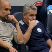 Juanma Lillo and Pep Guardiola in the Manchester City dugout