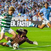 Kyogo in action against Man City during pre-season