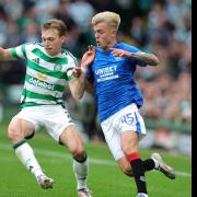 Celtic's Alistair Johnston (left) and Rangers' Ross McCausland battle for the ball during the William Hill Premiership match at Celtic Park, Glasgow. Picture date: Sunday September 1, 2024. PA Photo. See PA story SOCCER Celtic. Photo credit should read: