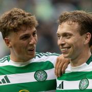 Arne Engels celebrates with Alistair Johnston after Celtic's win over Rangers