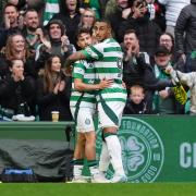 Celtic's Nicolas Kuhn (left) celebrates scoring their side's fourth goal of the game with team-mate Adam Idah during the Premier Sports Cup, quarter-final match at Celtic Park, Glasgow. Picture date: Sunday September 22, 2024. PA Photo. See PA story