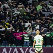 Daizen Maeda looks on at Celtic Park crowd celebrations